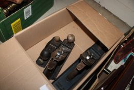 A collection of carpentry planes including smoothi