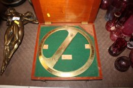 An early 20th Century mahogany cased brass protrac