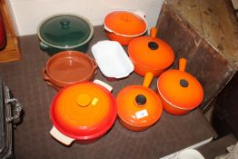 A Le Creuset saucepan, a Le Creuset casserole dish