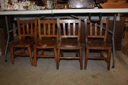 Four 1950's elm seated child's stacking chairs