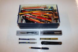 A box containing various stationery to include Par