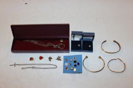A box containing various costume jewellery to incl