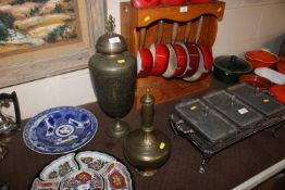 A large Oriental engraved brass baluster vase and