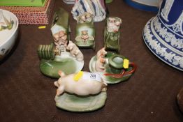 Six continental porcelain novelty pig groups
