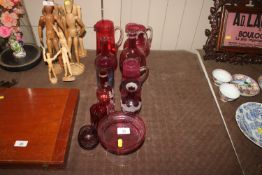 A collection of various cranberry and other ruby g