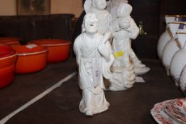 A Chinese blanc de chine figure of an elderly laug