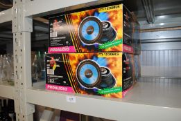 Two pairs of boxed Pro Audio speakers