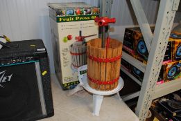 A fruit press with original box