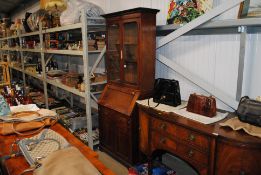 A mahogany bureau bookcase