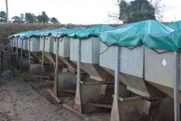 10 x Peter Allen feeders 750kg capacity c/w canvas covers.