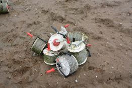 Rolls of electric fence wire as lotted
