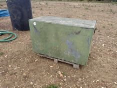 Water tank converted to cabinet