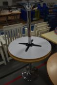 Two 80cm Circular Pedestal Tables