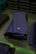 Four Black and One Purple Yoga Mats