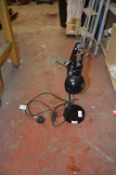 *Black Desk Lamp and a Handheld Work Light