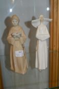 Two Spanish Figurines of a Monk and a Nun