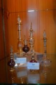 Six Decorative Miniature Glass Stoppered Bottles