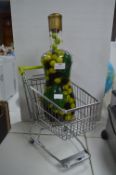 Miniature Shopping Trolley and a Bottle of Decorat