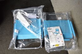 Two Folding Beach Chairs