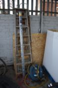 Two Wooden Step Ladders, Hose Reel, and a Doorfram