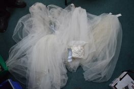 Six Bridal Veils and a Drawstring Bag