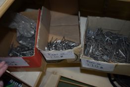 *Three Boxes of Bright Nails