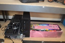 *Five Assorted Keyboards, a Computer Tower Case, and a Pink Headset