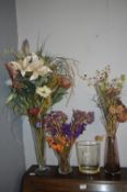 Four Glass Vases and Artificial Flowers