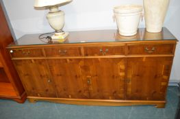 Glass Topped Four Drawer Sideboard