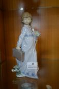 Lladro Figure of a Girl with Flowers