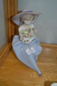 Lladro Figurine of a Seated Girl with Flowers