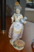 Lladro Figurine of a Girl Makin Paella