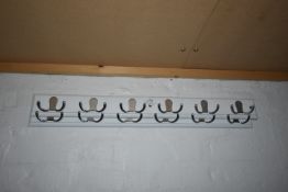*Twelve Angry Octopus Coat Hooks (Location: 64 King Edward St, Grimsby, DN31 3JP, Viewing Tuesday