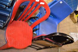 Six Plastic Chairs and One Folding Events Chair