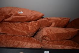 *Eight Terracotta Dralon Scatter Cushions