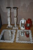 *Pair of Ornate Candlesticks, Two Decorative Hurricane Lamps, and a Pair of Metal Framed Mirrors