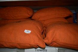 *Eight Orange Scatter Cushions