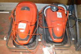 *Two Flymo Lawnmowers