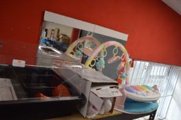 *Comtents of Shelf to Include Playmat, Bike Helmet, Electric Propagator