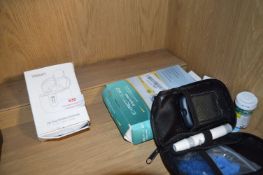 *Wireless Earbuds and a Blood Glucose Meter