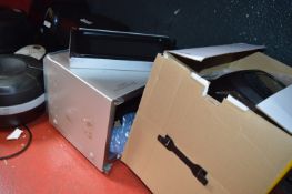 *Content Under Table to Include Air Fryers, Microwaves, and a Multicooker