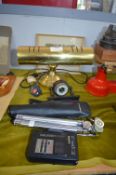 Brass Desk Lamp, Tripods, and Walkman