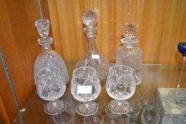 Three Cut Glass Decanters and Three Brandy Goblets