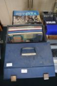 Two Record Cases Containing 12