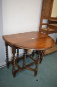 1930's Oak Drop Leaf Barley Twist Oval Table