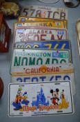 Nine Metal American Car Registration Plates