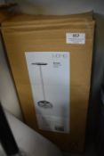 One Chrome and Three Black Toilet Roll Holders
