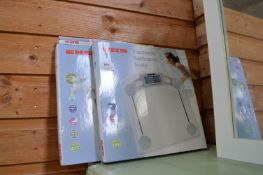 Two EKS Electronic Bathroom Scales