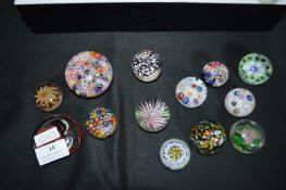 Twelve Small Glass Paperweight