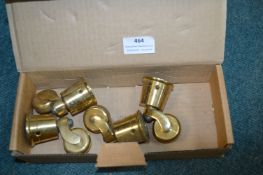 Four Brass Furniture Castors